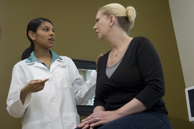 Dr. Radha Iyengar with patient 