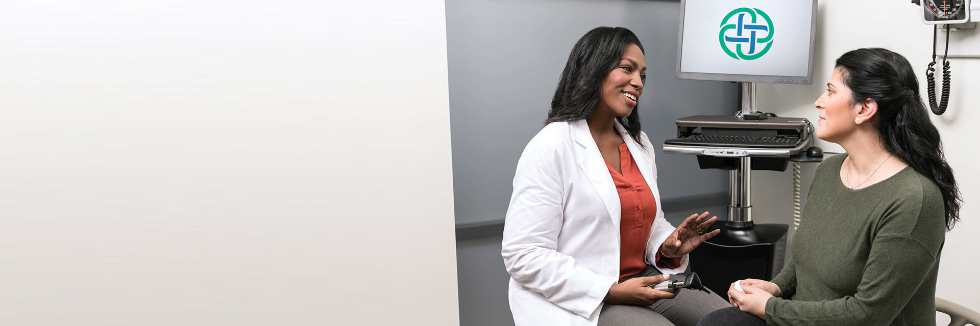 Doctor speaking with patient