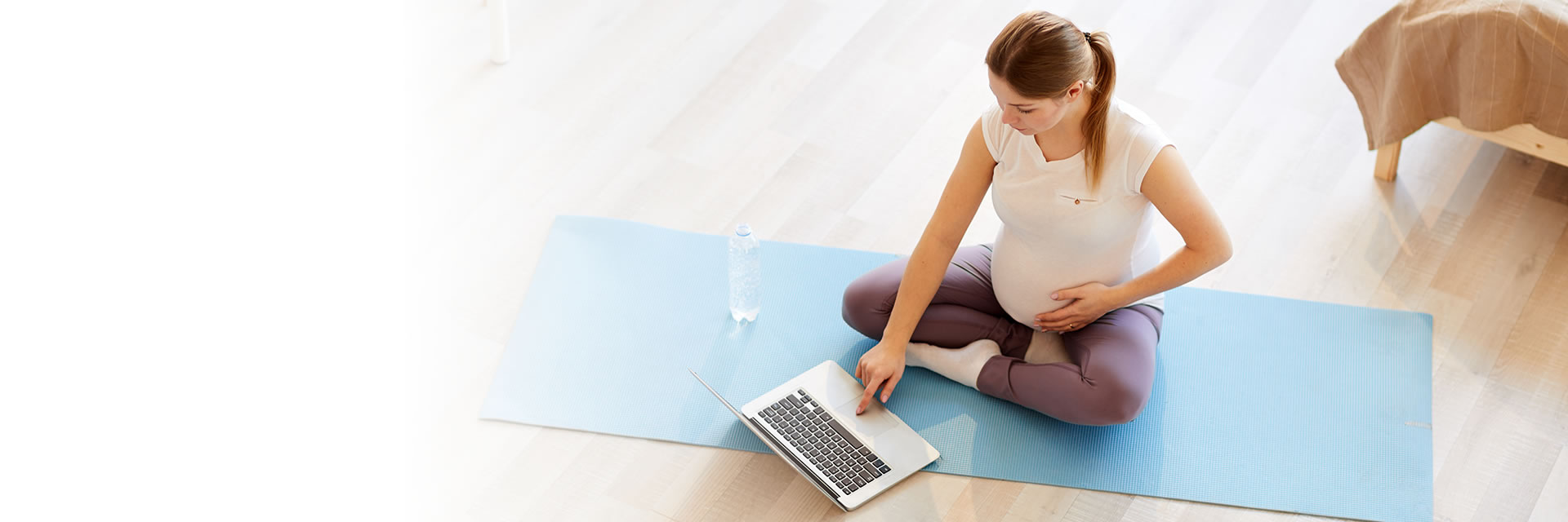 Pregnant Woman using laptop