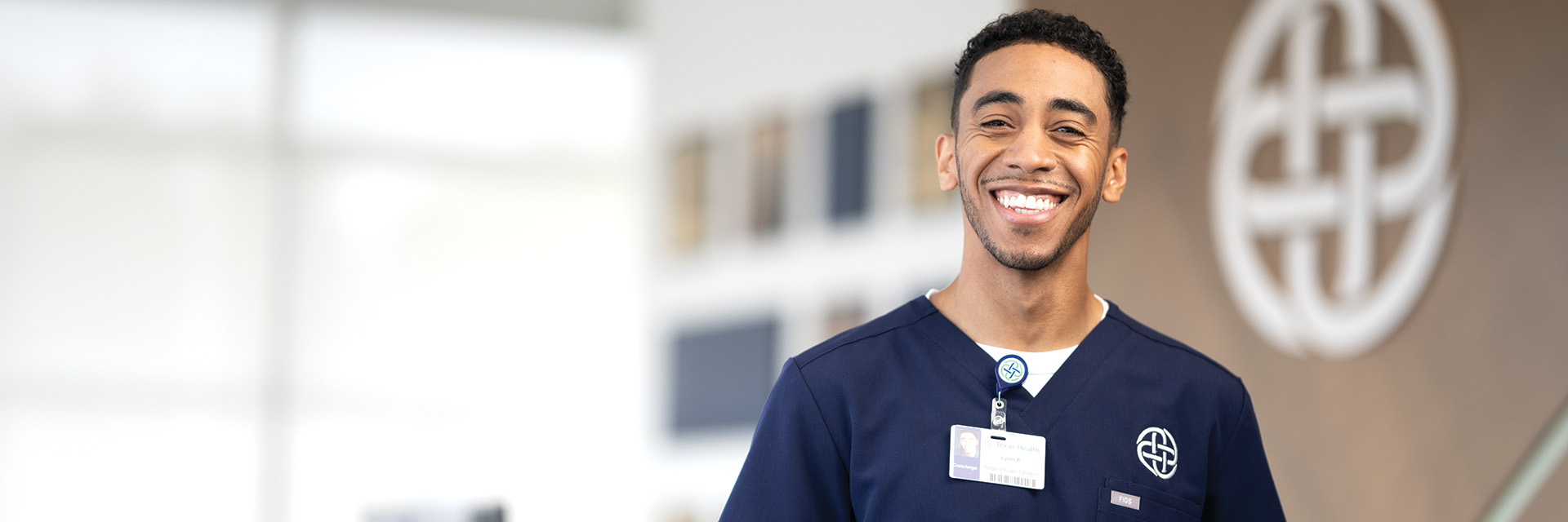 Provider in scrubs smiling