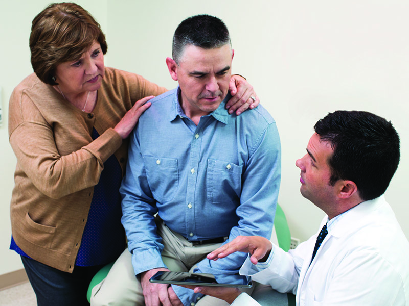 Male Patient Talking to His Doctor